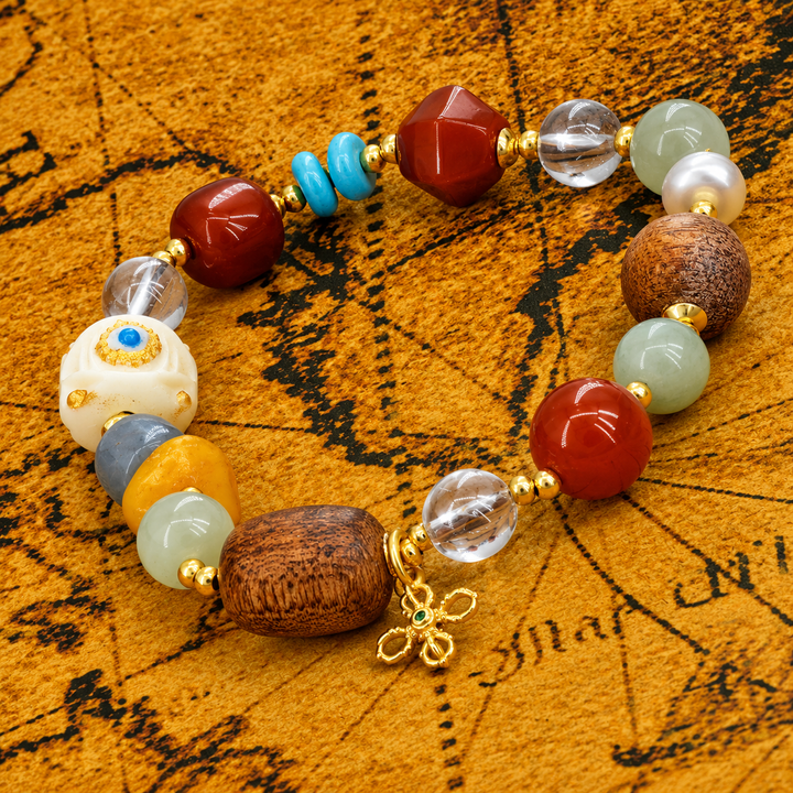 Handcrafted Himalayan Stone & Wood Mala Bracelet with Carved Evil Eye Bead, Red Agate, and Auspicious Dorje Charm