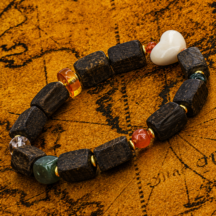 Handcrafted Dark Wood & Crystal Mala Bracelet with Carved Heart Bead, Green Jade, and Auspicious Amber Accents