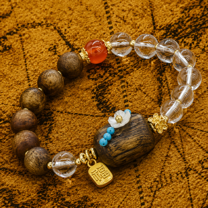 Artisanal Sandalwood and Clear Quartz Bracelet Featuring Mother-of-Pearl Blossom Accent, Carnelian Bead, and Gold Fortune Charm