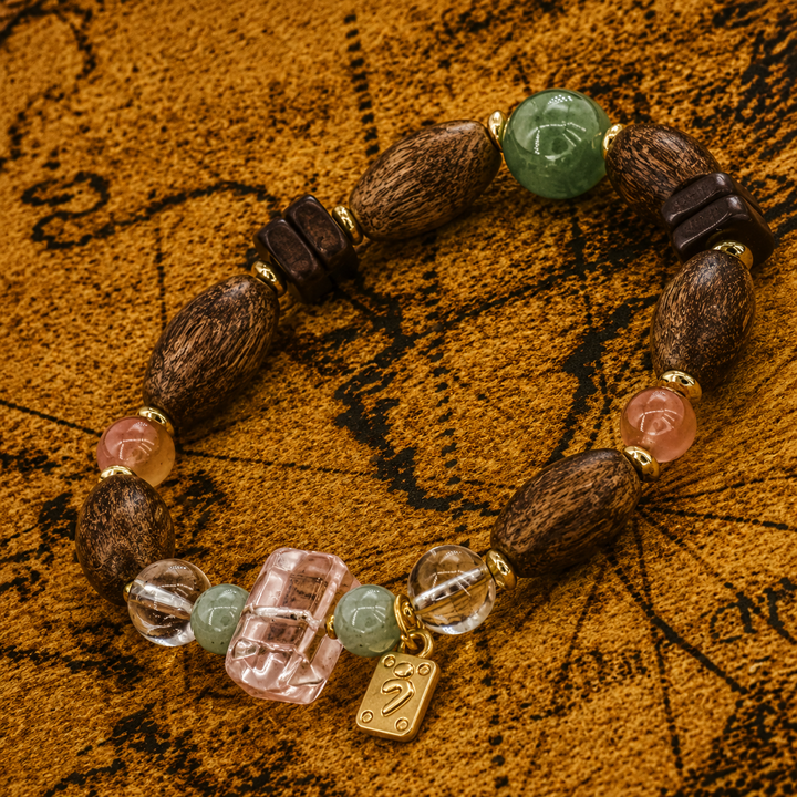 Himalayan Natural Wooden Bead and Crystal Gemstone Bracelet Featuring Faceted Pink Quartz, Green Jade, and Gold-Plated Spiritual Charm