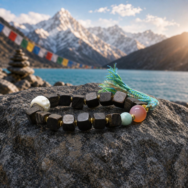 Handcrafted Square Dark Wood Beaded Bracelet Featuring Carved Bone Skull, Pink Agate, Green Jade, Gold Spacers, and Multicolored Tassel